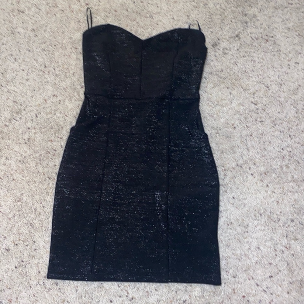 Never worn black strapless dress that has pockets
